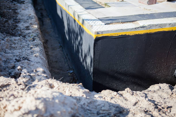 Professional Waterproofing technician working in Gas City, IN